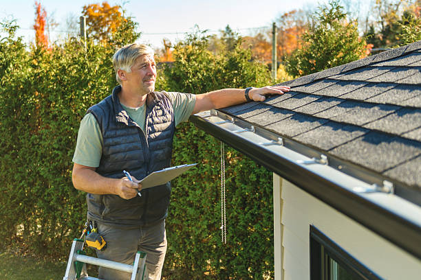 Professional Roofing technician working in Williamson, IA